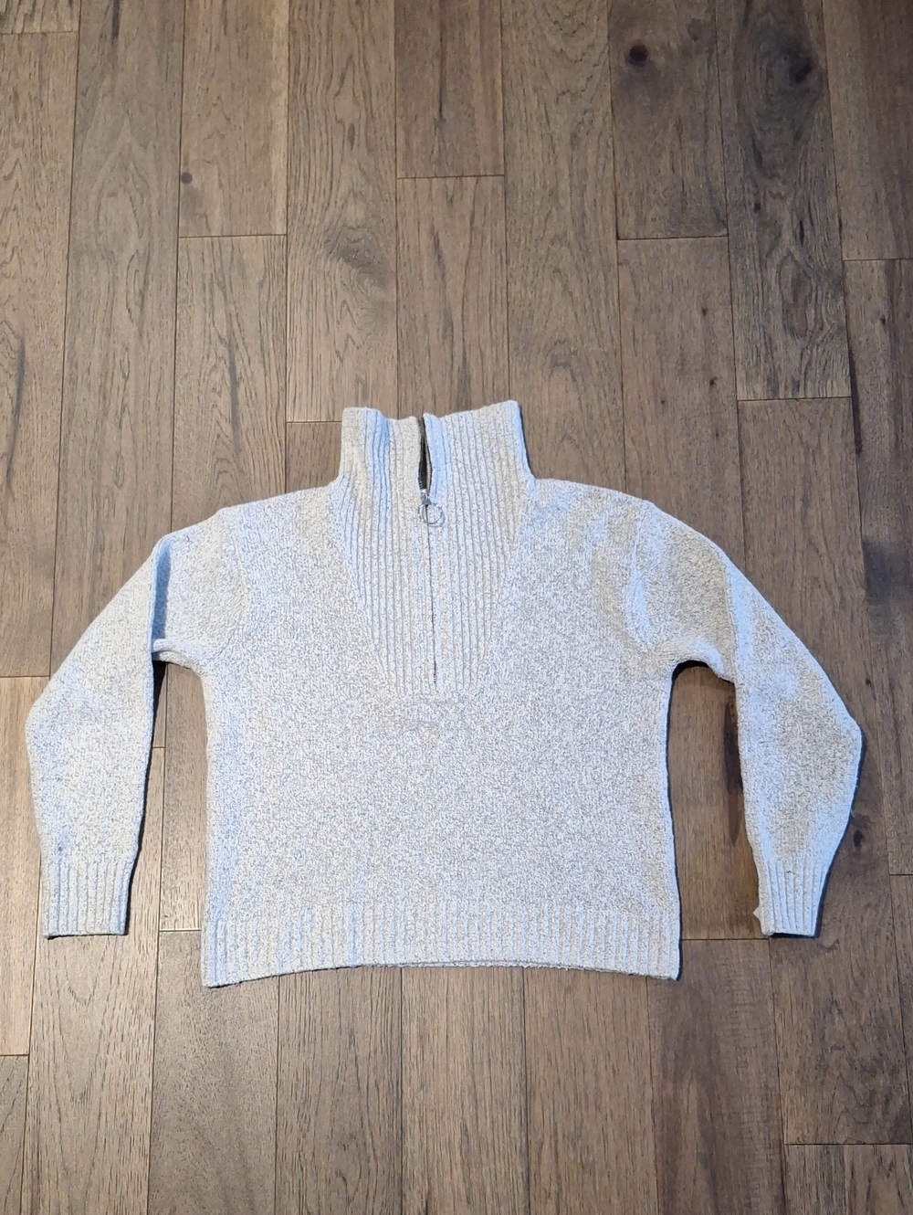 Heathered sweater with cowelneck zipper.